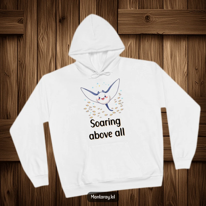Funny Hoodie depicting a triumphant manta ray, wings outstretched, soaring powerfully through a shimmering school of tiny fish, a symbol of strength.
