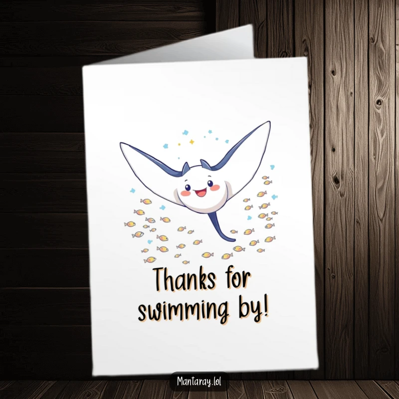 Funny free printable Thank You card: A triumphant manta ray with wings outstretched soars with grace through a school of tiny fish.